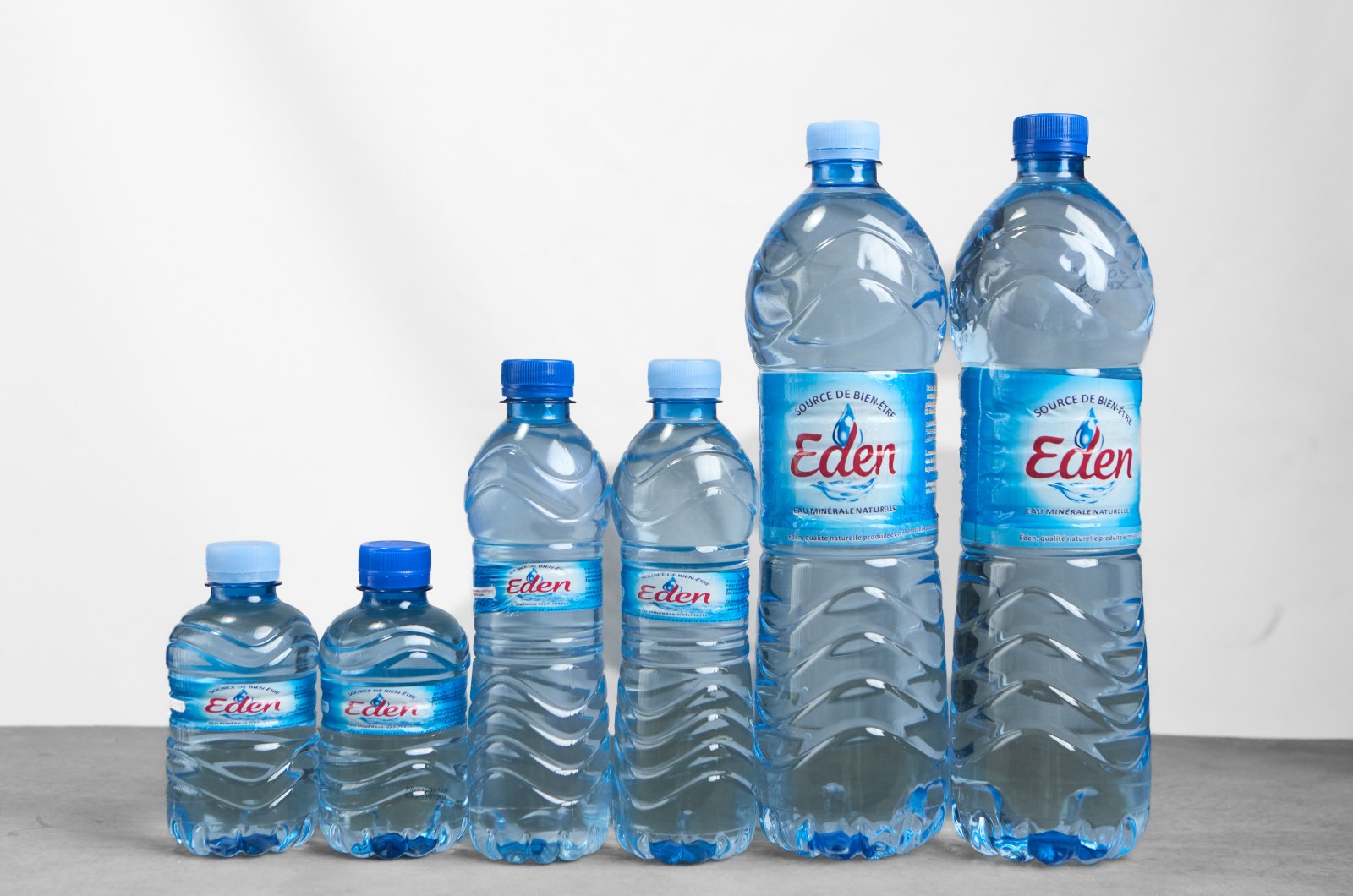 Gamme de bouteilles d'eau minérale Eden, du format 33cl au format 1,5L